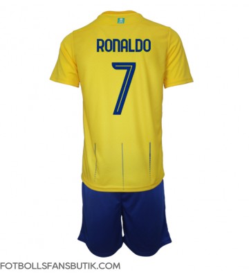 Al-Nassr Cristiano Ronaldo #7 Replika Hemmatröja Barn 2023-24 Kortärmad (+ Korta byxor)